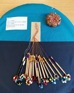 Pillow and bobbins